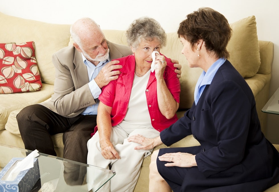 funeral director meeting with clients