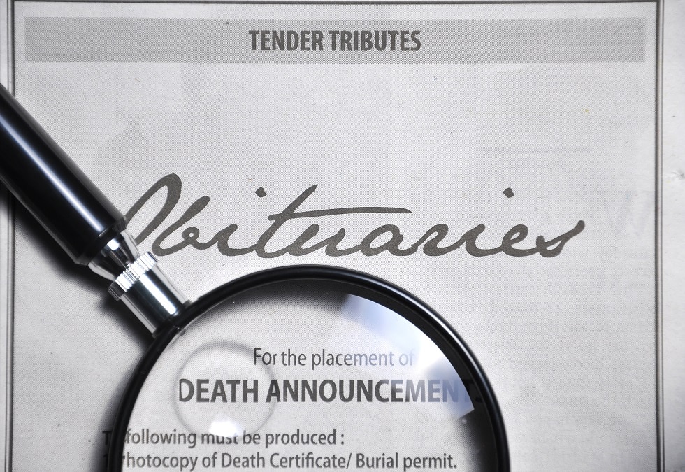 obituaries advertisement on newspaper